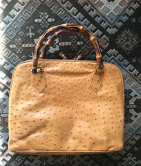 Vintage GUCCI orange brown color genuine ostrich leather bolide bag style handbag with bamboo handles. Masterpiece from Bamboo collection.