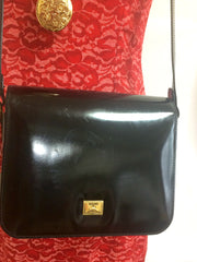 Vintage MOSCHINO black patent enamel leather shoulder bag with red heart motif at closure. Must have mod purse by Red Wall.
