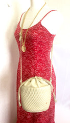 Vintage BALLY ivory white quilted lambskin mini hobo, bucket shoulder bag with golden B charm and drawstrings.