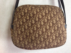 70's vintage Christian Dior brown trotter jacquard handbag with the gold tone large CD motif. ECLAIR zippers. Unisex