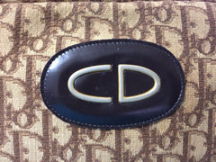 70's vintage Christian Dior brown trotter jacquard handbag with the gold tone large CD motif. ECLAIR zippers. Unisex