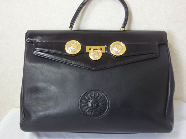 Vintage Gianni Versace genuine black leather Kelly style bag with Meda –  eNdApPi ***where you can find your favorite designer  vintages..authentic, affordable, and lovable.