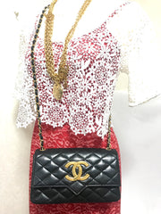 80's vintage CHANEL black lambskin shoulder bag with golden large CC closure and beak tip flap tip. Classic 2.55 bag