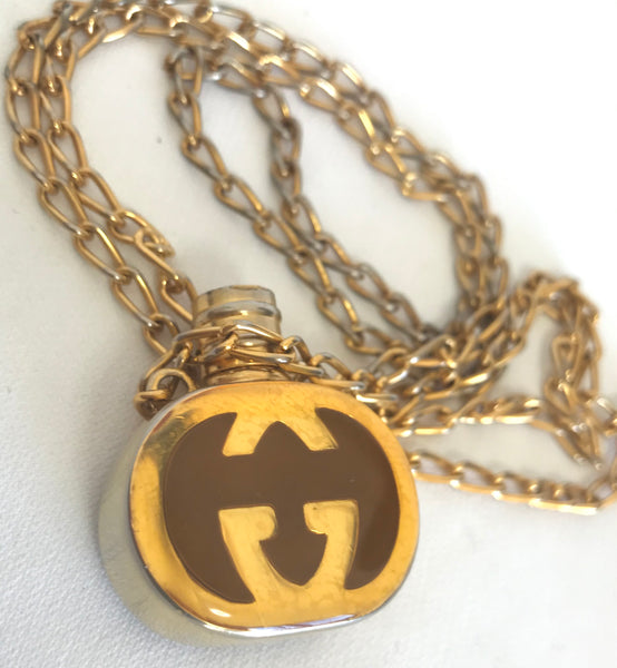 Vintage Gucci gold and brown round shape perfume bottle necklace with –  eNdApPi ***where you can find your favorite designer  vintages..authentic, affordable, and lovable.