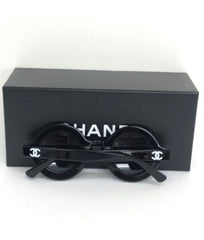 Vintage CHANEL black round frame mod sunglasses with white CHANEL PARIS logo. 060412