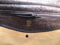 Vintage GUCCI dark brown genuine ostrich leather fisherman bag style shoulder bag with logo embossed motif. Rare masterpiece.