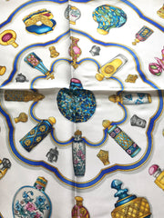 Vintage HERMES Carre large silk scarf with blue, yellow, green, pink, multicolor perfume bottle print in wine. Qu' importe le flacon.