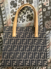 Vintage FENDI classic logo pecan jacquard and mustard yellow epi leather tote bag with golden closure at front.