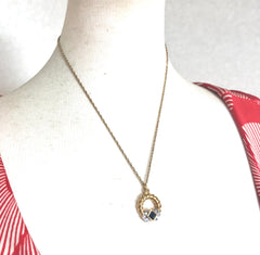 Vintage LANVIN golden skinny chain necklace with golden round pendant top. Clear crystals and green glass stone. Perfect jewelry gift.