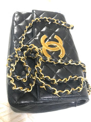 80's vintage CHANEL black lambskin shoulder bag with golden large CC closure and beak tip flap tip. Classic 2.55 bag