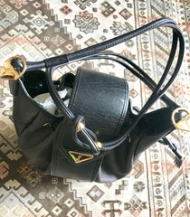 Vintage Yves Saint Laurent black and purple hobo bucket shoulder bag with leather trimmings and golden logo plate. YSL classic purse.