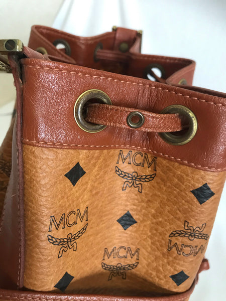 Vintage MCM brown monogram hobo bucket shoulder bag. Designed by Micha –  eNdApPi ***where you can find your favorite designer  vintages..authentic, affordable, and lovable.
