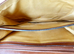 Vintage Gucci brown leather micro GG print shoulder bag with iconic golden large round GG motif. Rare masterpiece purse.