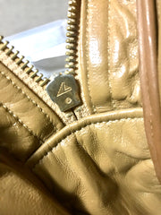 80's Vintage CHANEL brown lambskin large classic bag with double golden chain strap and a CC pull charm.