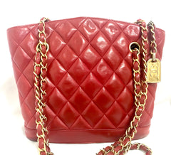 Vintage CHANEL lipstick red quilted lambskin leather trapezoid shape tote bag with a gold CC plate and chains.