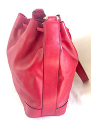 Vintage Celine red leather hobo bucket shoulder bag with a golden square logo motif and matching pouch. Classic drawstrings purse.