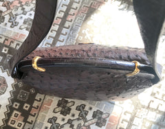 Vintage GUCCI dark brown genuine ostrich leather fisherman bag style shoulder bag with logo embossed motif. Rare masterpiece.
