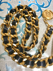 NEW/Mint. Vintage CHANEL black leather thick chain belt with golden logo bar plate and CC charm. Nice and heavy single layer belt