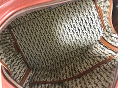 Vintage Yves Saint Laurent brown leather handbag with YSL marks. Classic unisex use bag, speedy bag.
