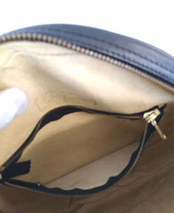 Vintage MCM black monogram round shape Suzy Wong shoulder bag with leather trimmings and fringes. Unisex. West Germany made.