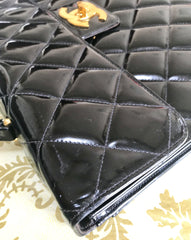 1990s. Vintage CHANEL black patent enamel briefcase business bag with golden large CC motif. Classic and traditional masterpiece you must have.