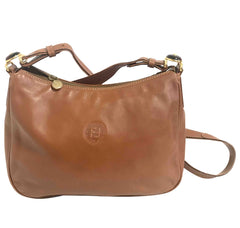 Vintage Fendi brown leather messenger shoulder bag with embossed logo and clear brown and golden motifs. Unisex.