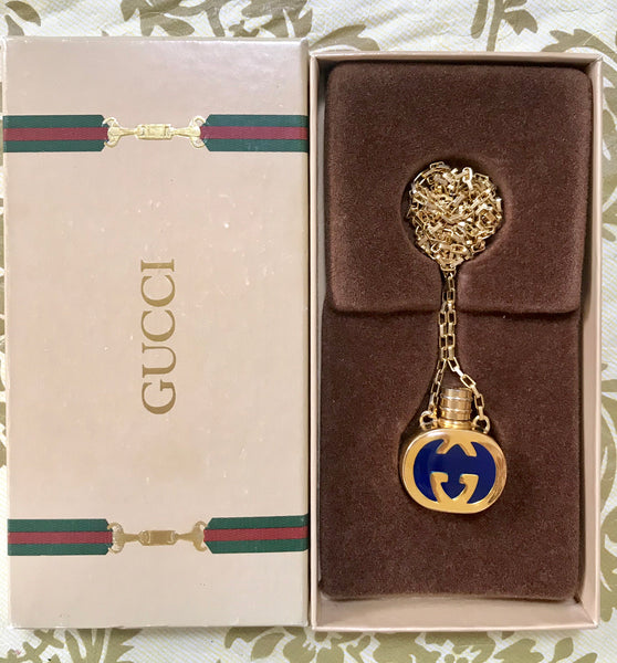 Vintage Gucci gold and navy round shape perfume bottle with i – eNdApPi ***where you can find your favorite designer vintages.....authentic, affordable, and lovable....