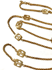 Vintage Lanvin golden chain long necklace with logo motif charms. Rare Lanvin vintage jewelry. Long necklace. 0403311