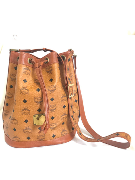 Authentic MCM cognac barrel bag. interior is in good