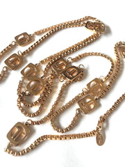 Vintage Lanvin golden chain long necklace with logo motif charms. Rare Lanvin vintage jewelry. Long necklace. 0403311