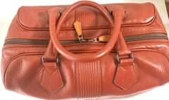 Vintage Yves Saint Laurent brown leather handbag with YSL marks. Classic unisex use bag, speedy bag.