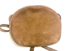 Vintage Longchamp brown suede leather oval round shape shoulder bag with leaf applique motifs. Rare and unique bag back in the okd era.