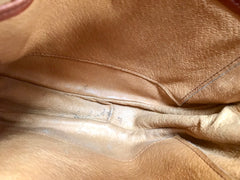 Vintage MCM brown monogram round Suzy Wong shoulder bag with brown leather trimmings. Designed by Michael Cromer. Classic masterpiece bag.