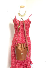 Vintage Chloe brown leather drawstring bucket hobo shoulder bag with a golden logo motif. Classic purse that never go out of style.