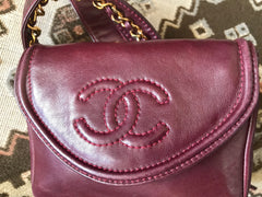 Vintage CHANEL wine fanny pack, leather belt bag with detachable chain belt and CC stitch mark on flap. Fits 29.5" -32.6" 070502re2