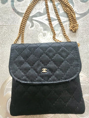 Vintage Chanel black quilted satin fabric mini pouch, coin purse, long necklace with golden chain and CC motif. Fiocci snap. 060516re2