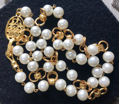 Vintage CHANEL golden chain and faux pearl long necklace with arabesque CC mark motif. Can be double or used as a belt as well.