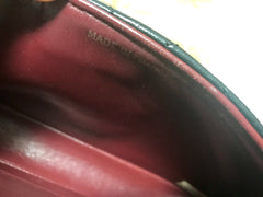 80's vintage CHANEL black lambskin shoulder bag with golden large CC closure and beak tip flap tip. Classic 2.55 bag