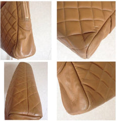 80's Vintage CHANEL brown lambskin large classic bag with double golden chain strap and a CC pull charm.