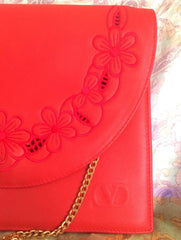 Vintage Valentino Garavani red leather clutch shoulder bag with red flower embroidery deco on the flap and V logo.