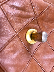 L20190528. 1990s. Vintage CHANEL brown calf leather belt bag, fanny pack, hip bag with gold CC closure and chain belt. Belt fits 29.3" through 32.5".