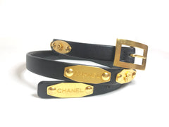 Vintage CHANEL black belt with golden buckle and iconic logo motifs, CC mark, camellia flower, turtle, perfume, clover. R0410113