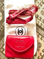 Vintage CHANEL red leather belt bag, fanny pack with detachable chain belt and CC stitch mark on flap. Fits 29.5" through 32.8"