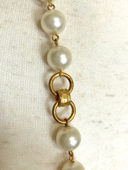 Vintage CHANEL golden chain and faux pearl long necklace with arabesque CC mark motif. Can be double or used as a belt as well.