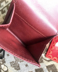 Vintage Cartier genuine wine leather square coin case with gold tone frames. must de Cartier. Unisex use. 060905r5