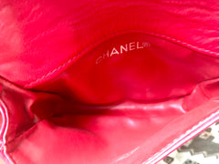 Vintage CHANEL red leather belt bag, fanny pack with detachable chain belt and CC stitch mark on flap. Fits 29.5" through 32.8"