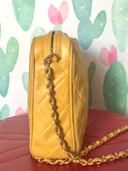 Ves Vintage Chanel yellow lambskin camera bag style chain shoulder bag with fringe and CC stitch mark. Good daily purse. Good fortune color.