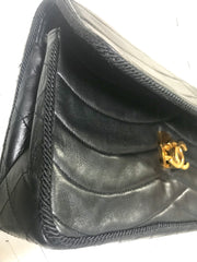 80's vintage Chanel black 2.55 shoulder bag with wavy stitches and rope strings and gold chain strap. Very rare piece from the era