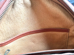 Vintage MCM brown monogram round Suzy Wong shoulder bag with brown leather trimmings. Designed by Michael Cromer. Classic masterpiece bag.
