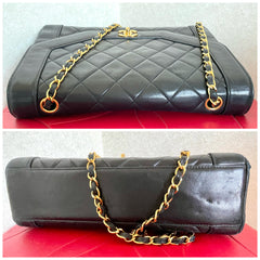 Vintage Chanel black lambskin chain 2.55 shoulder bag with gold chain. Unique hexagon shaped flap. 0407012
